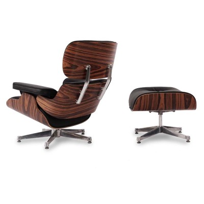 Replica van de Eames fauteuil in kunstleer en chromen onderstel van Charles & Ray